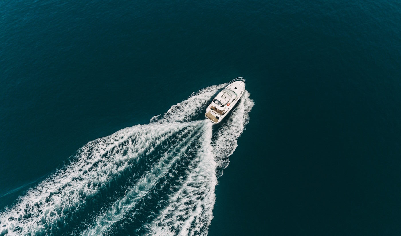 boat cruising from above