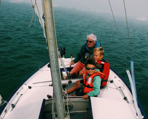 wearing life jackets on sailboat