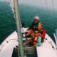 wearing life jackets on sailboat