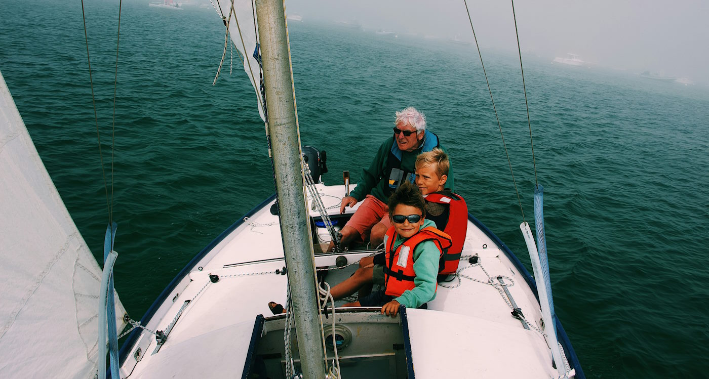 wearing life jackets on sailboat