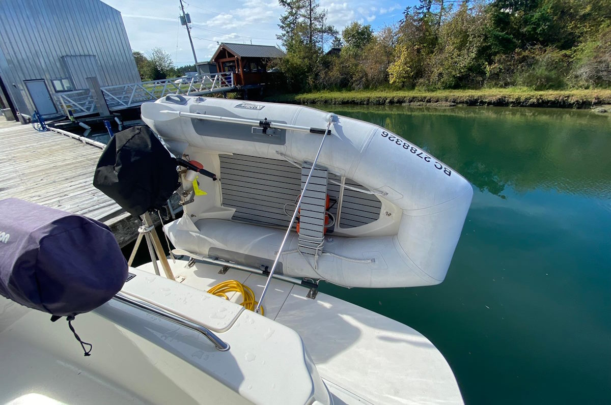 dinghy on the back of boat