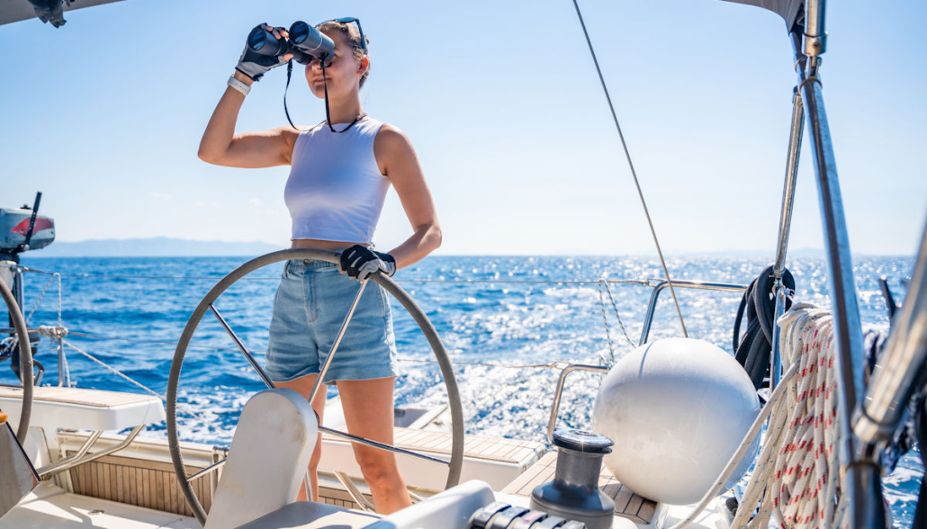 using binoculars on boat