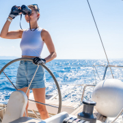 using binoculars on boat