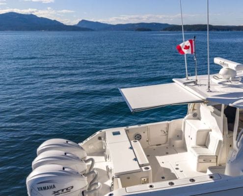 Pursuit boat with Canada flag